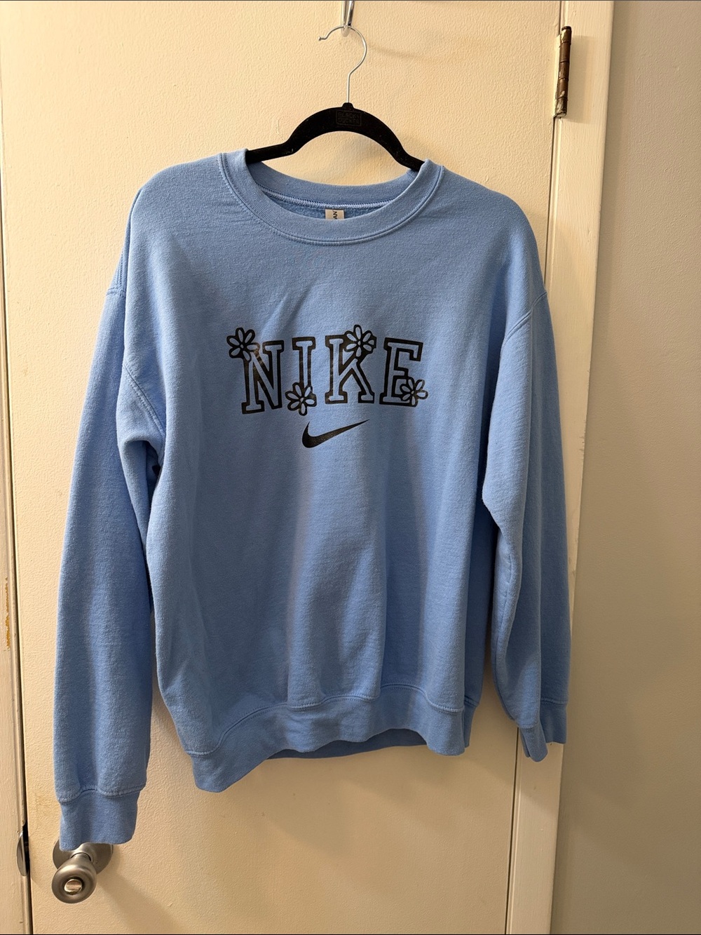 Nike Light Blue Crewneck Sweatshirt with Black floral Logo